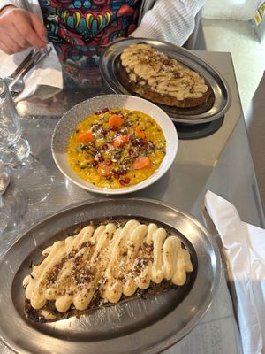 Pulled 'mushrooms' with vegan bechamel sauce & sour cabbage toast on sourdough bread, and daily dish with buckwheat. at 201 STUDIO in Zagreb