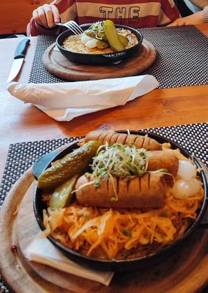 Vegane Rösti mit Sauerkraut und veganer Wurst at Fein Restaurant in Leukerbad