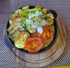 The Rösti is hidden under all the grilled vegetables! at Fein Restaurant in Leukerbad