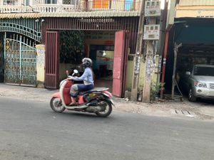 Next door to a garage on the right. at Maitreya Healthy Vegetarian Restaurant in Phnom Penh