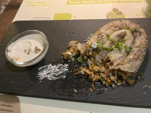 Burek/börek filled with BioMania mixture and served with a garlic sour cream  at BioMania Bistro in Zagreb