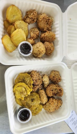 Cauliflower wings with Tostones and a side of BBQ sauce at La Antropología de la Comida in Salinas