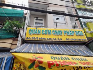 Name with 2 address and a phone number at Pháp Hoa in Ho Chi Minh City