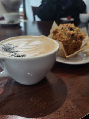 Black sesame latte with blueberry muffin at Three Cats Coffee in Woodinville