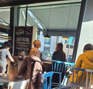 It has tables to enjoy your meal at Greggs - 421 Strand in London