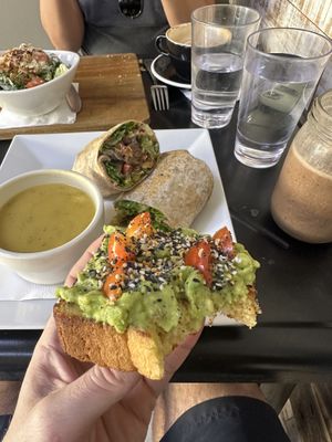 Avo toast, hazelnut smoothie, corn chowder, bbq vegan chorizo sandwich   at Island Naturals Cafe in Seven Mile Beach