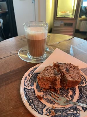 Vegan banana bread and oat milk latte  at Koffiehuisje Eindhoven in Eindhoven