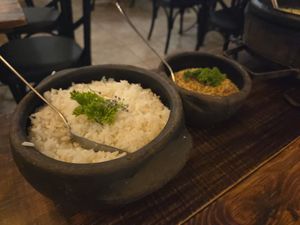 Moqueca de banana rice and citrus farofa at Bananaland in Rio De Janeiro