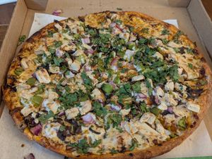Plant based chicken Tikka masala pizza at Pizza Twist - N Euclid Ave in St Louis