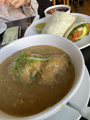Sausage gravy and biscuits and Breakfast burrito (both vegan)  at Handlebar in Chicago