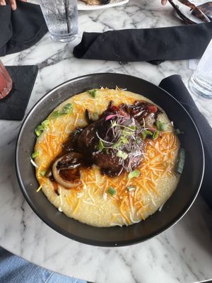 Vegan oxtails and grits  at Bar Vegan Baltimore in Baltimore