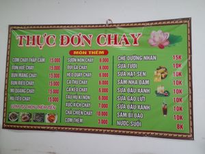 Menu on wall at Diệu Mai 15K in Ho Chi Minh City