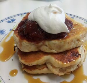 Vegan white chocolate pancakes with soy cream, rhubarb compote and maple syrup. Part of the weekend breakfast menu at Pearfect Pantry: they generally have vegan pancakes, but the flavours will vary. at The Pearfect Pantry in Osbourne Park