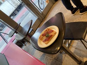 Tables, with my vegan slice  at Unregular Pizza - Upper East Side in New York City