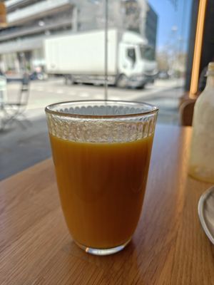 Mango, passion fruit juice/smoothie at Magma Bakery Lab  in Barcelona