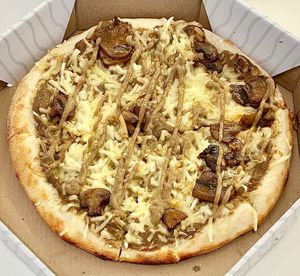Truffle pizza  at Vegan Burger - Al Ghurair Centre in Dubai