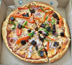 Tandoori pizza at Vegan Burger - Al Ghurair Centre in Dubai