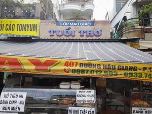 Address and phone numbers at Quán Chay 407 in Ho Chi Minh City