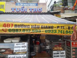 Address and phone numbers at Quán Chay 407 in Ho Chi Minh City