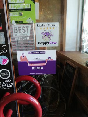 HappyCow Aufkleber at SlimJims in Hamburg