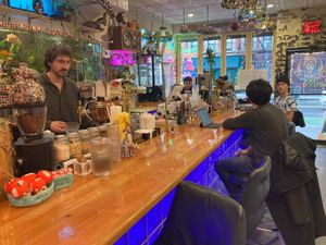 Bar (they also have seating in the back) at Kosmic Community Anti Bar & Coffee Shop in New York City