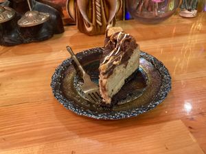 Vegan cheesecake at Kosmic Community Anti Bar & Coffee Shop in New York City