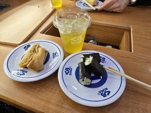 Cucumber maki, inari and an iced uji matcha at Kura Sushi - Nijo in Kyoto