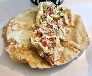 Hummus and green salad sandwich at Foul w Hummus in Dubai