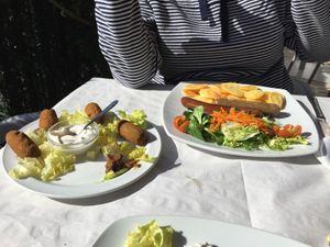 Spinach and pine nut croquettes; sausages, salad and fried pitatoes at Aloe in Almeria