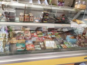 Fridge - lots of vegan cheeses! at Aloe in Almeria