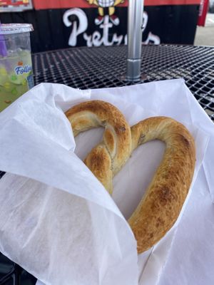 Fresh Pretzel Enjoyed in the Shade w/Cucumber Aguga Fresca from Another Food Stall (Super Recommend BOTH)  at Twisties Pretzels in Modesto