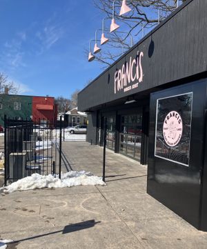 Exterior March 2025. Walls open to an outdoor seasonal patio. at Francis Burger Joint  in Minneapolis