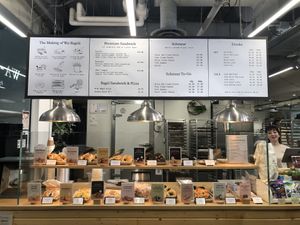 Located in the lower level right next to the stairs. Menu is take out.   at WA - Bagel in Vancouver