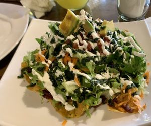 Super Nachos with awesome chimchurri sauce! at El Chante Gourmet in Alajuela