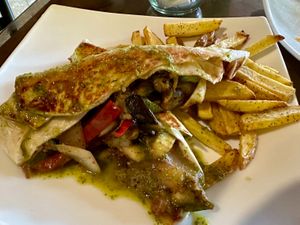 Vegetable burrito with herb sauce at El Chante Gourmet in Alajuela