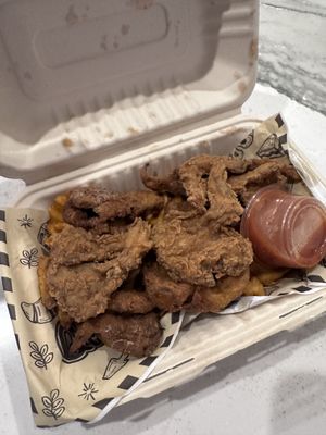 Mushroom chicken with waffle fries   at Breath'g Vegan Food Truck in Merrillville