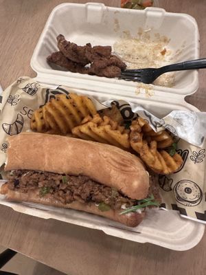 Phill cheese steak with waffle fries   at Breath'g Vegan Food Truck in Merrillville