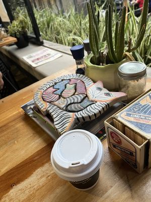 Plenty of games to play in a nice green space   at Lucky Cat Cafe in Ipswich