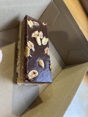 Snickers slice great caramel   at Lucky Cat Cafe in Ipswich