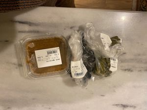 Pickled cucumbers, olives, and fresh hazelnut butter.   at Nifassa  in Tunis