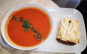 Red Pepper, Carrot and Tomato Soup served with a savoury pastry at Harvest Moon Suffolk in Ipswich