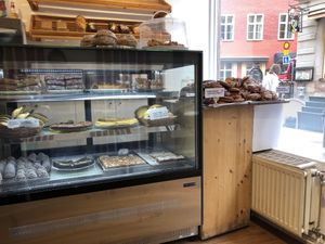 Inside. The top shelf of case is all vegan cakes. To the right are the vegan and non vegan cinnamon rolls. Also have vegan chocolate muffins! at Sattva Naturbageriet in Stockholm