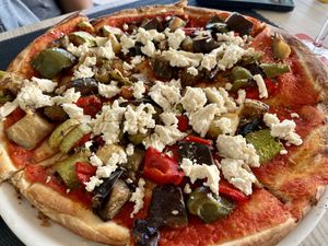 Cheese-less pizza topped with tofu  at Las Burras Beachouse  in Gran Canaria