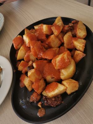 Patatas bravas (make sure to ask for no aioli as this place makes it with egg. at Las Burras Beachouse  in Gran Canaria