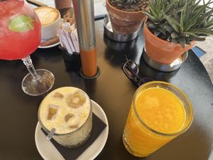 Melon cooler, iced latte with oat milk and fresh orange juicee  at Bohini - Coffee Shop & Restaurant in L-imgarr