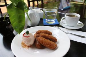 Cashew Nut Crusted Banana Fritters with Kaffir Lime Syrup and Coconut Chili Gelato at Sandan in Sihanoukville