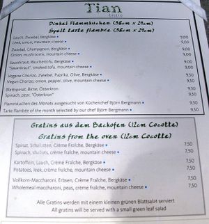 the blue dot stands for optional vegan at TIAN Bistro Kunsthaus in Vienna