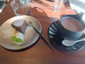 Chocolate cake and amazake (fermented rice drink) at Ginger Foot Bath - 生姜足湯休憩所 in Nara