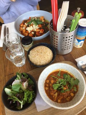 Chickpea curry with a side of brown rice & vegan gnocchi with sweet potato, napoli & vegan almond “feta” at Sister of Soul in St Kilda