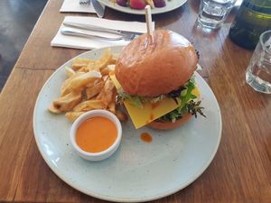 Smoked tofu burger on vegan brioche bun with shichimi fries and sriracha mayo at Sister of Soul in St Kilda